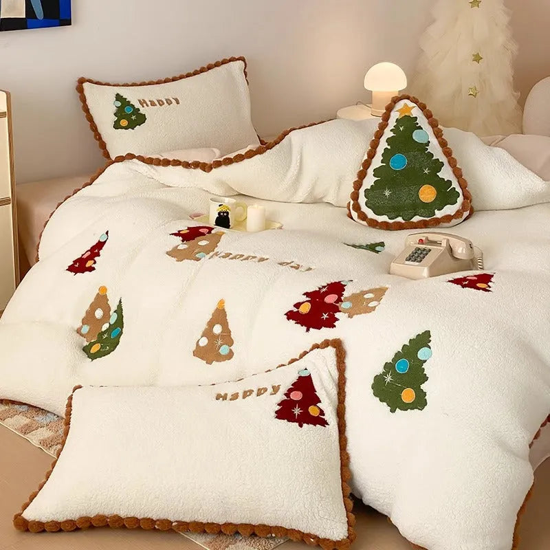 Bright yellow fleece-lined bedding set with cartoon Christmas trees, showing quilt cover and pillowcases.