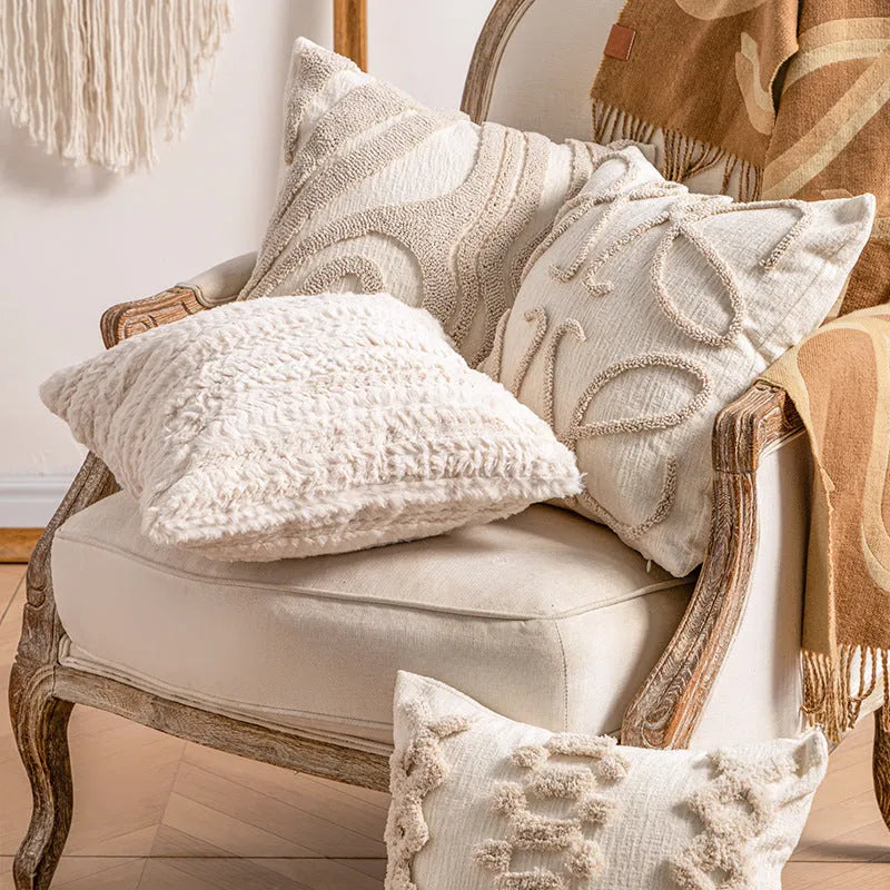 Decorative cushion cover with knitted tassel trim in spiral dots pattern, 45x45cm size.