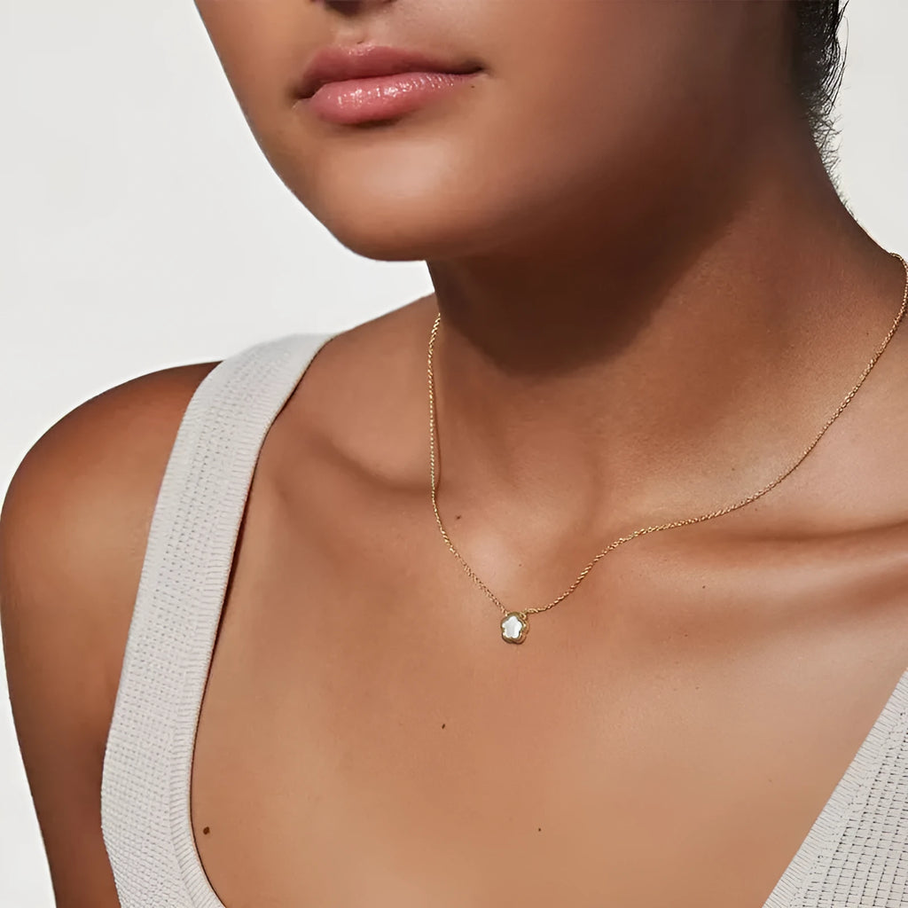 White mother shell flower pendant necklace on copper O-shaped chain in silver finish
