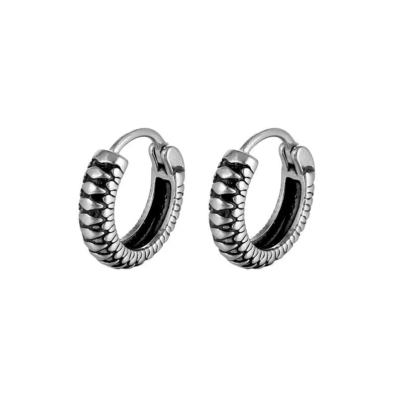 Silver titanium steel retro earrings with a geometric twist and striped design.