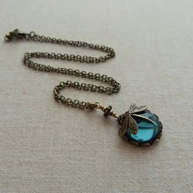 Yellow dragonfly pendant necklace with hand-carved vintage bronze design on 925 silver