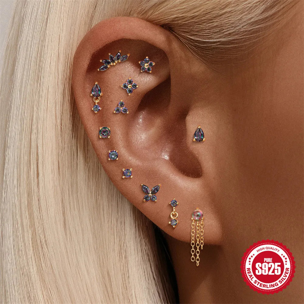 S925 sterling silver geometry earring with rainbow stone and flat head thread piercing post in a gold colour.