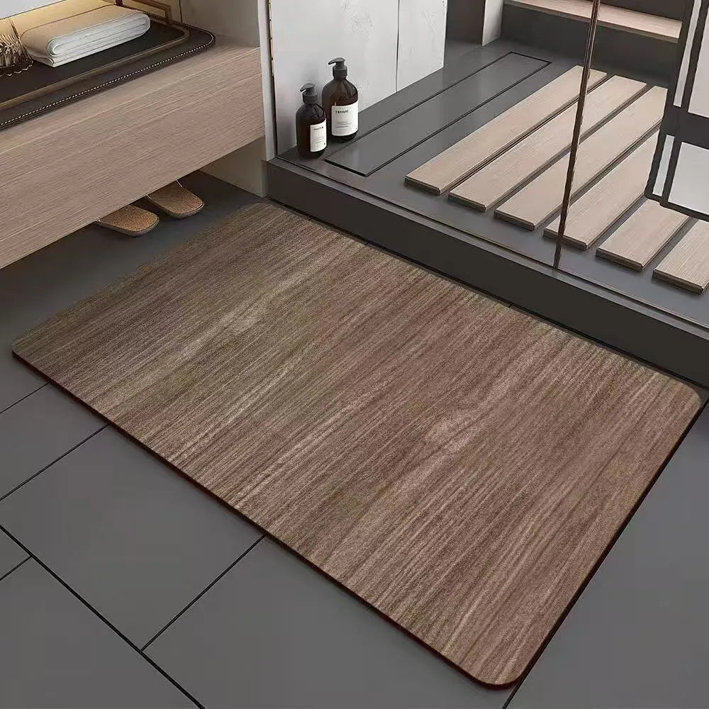 Square diatomite bathroom floor mat with wood grain pattern in a bathroom setting.