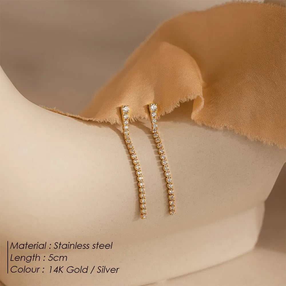 Geometric stainless steel zircon stud earrings with linear detailing in gold and steel tone options
