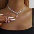 Rhinestone claw chain necklace and earrings set with water drop shape, available in multiple colours for women.