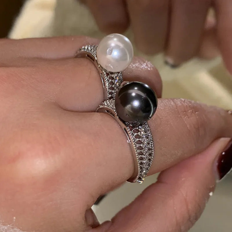 Black pearl geometric open ring with adjustable opening on index finger