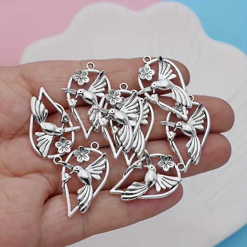Alloy flying magpie pendant charm with electroplated finish in colour P234 for DIY jewellery making