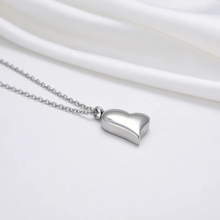 Silver curved heart pendant on adjustable stainless steel necklace chain