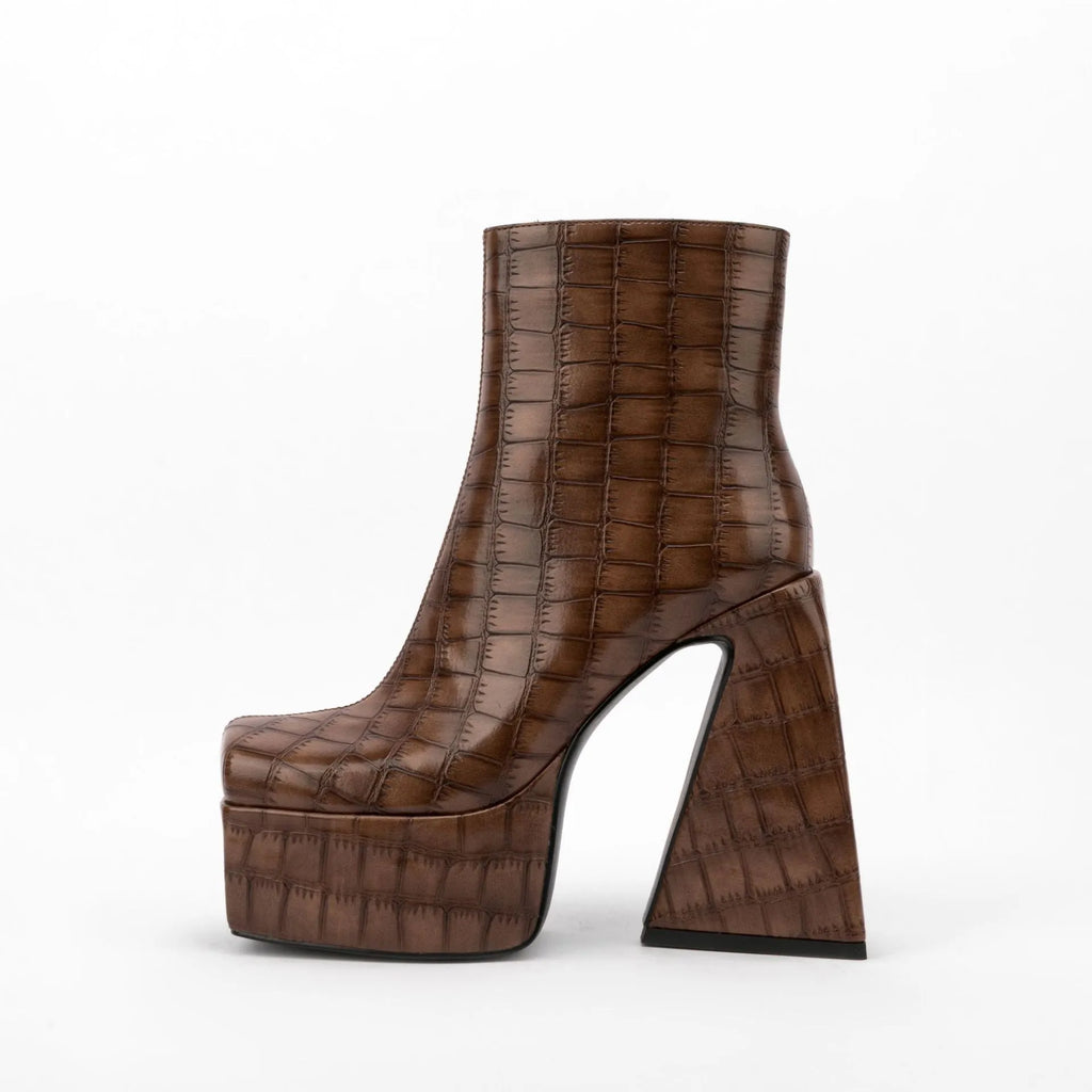 Women's high heel ankle boots in red, green, black, beige, and brown colours with over 8cm heels.