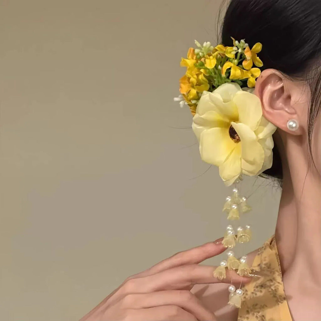 Yellow or purple tassel hair clip with flower decoration and mixed materials