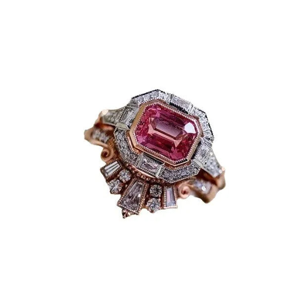Rose gold-tone women's retro style ring with geometric ruby design on a hand.