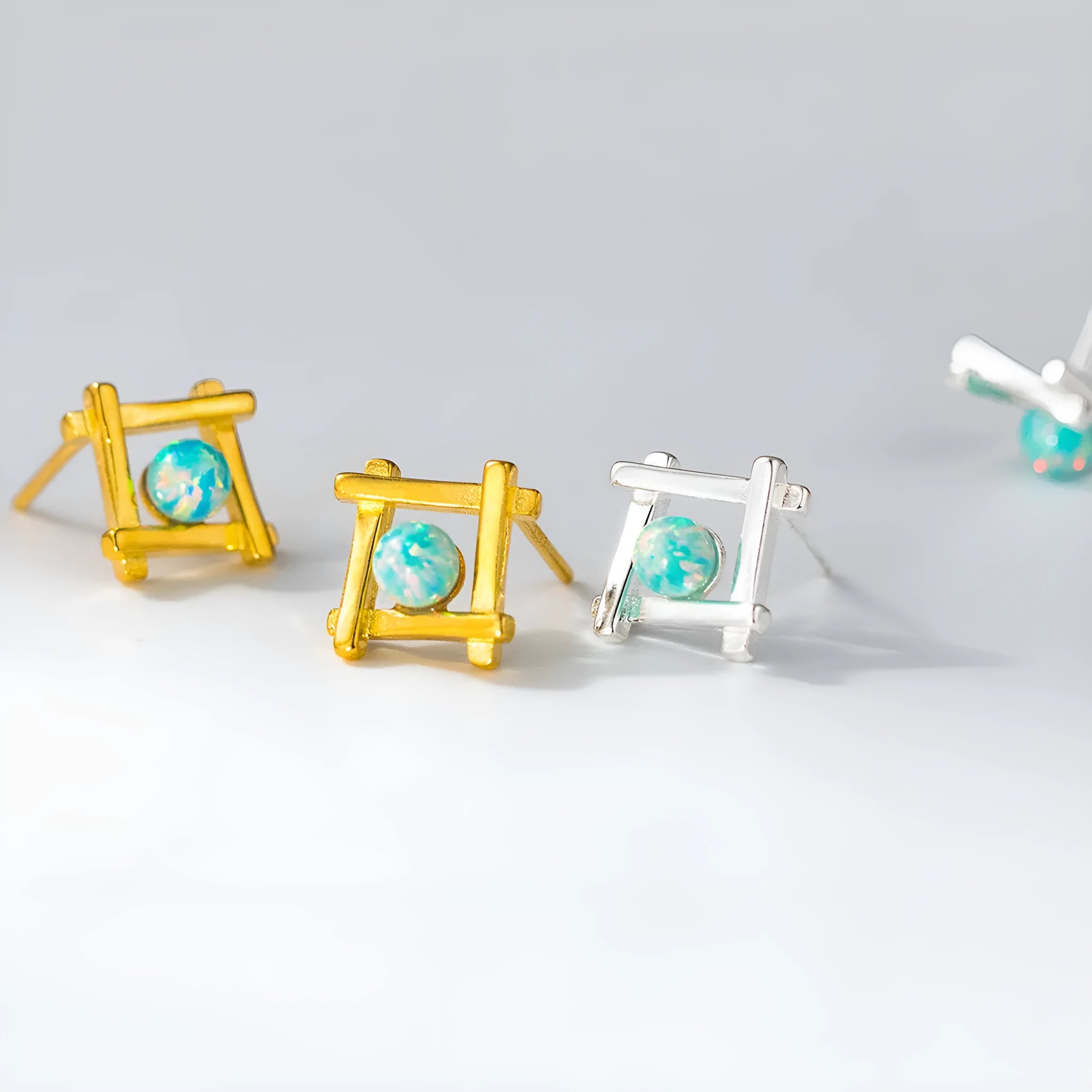 Women's geometric cross quadrangle stud earrings in sterling silver with silver or gold plating