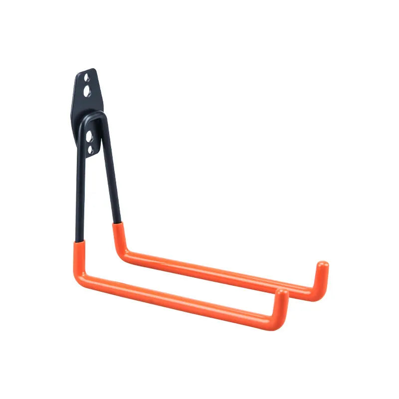 Carbon steel wire-wrap board storage rack with fixed hooks in bright orange finish on wall holding tools