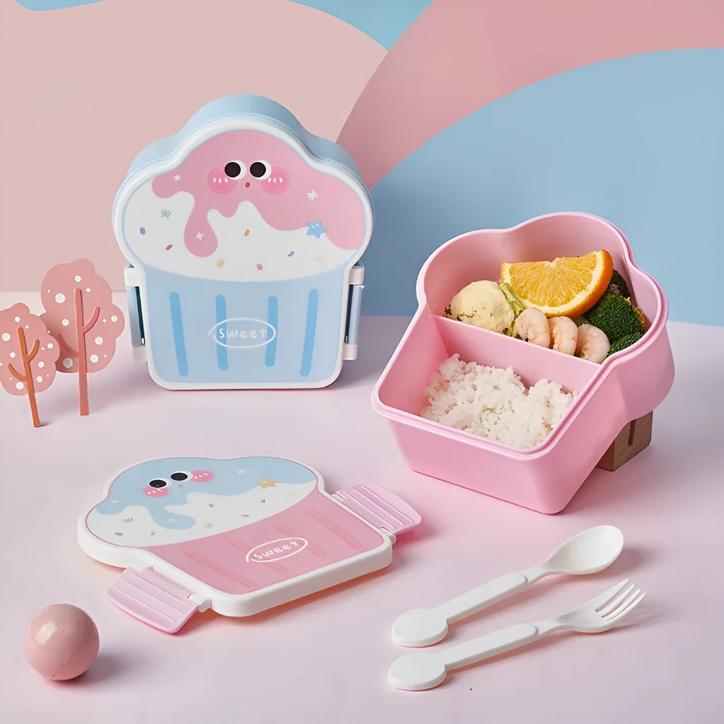 Pink and blue creative ice cream shaped plastic lunch box with spoon and fork set on a table.