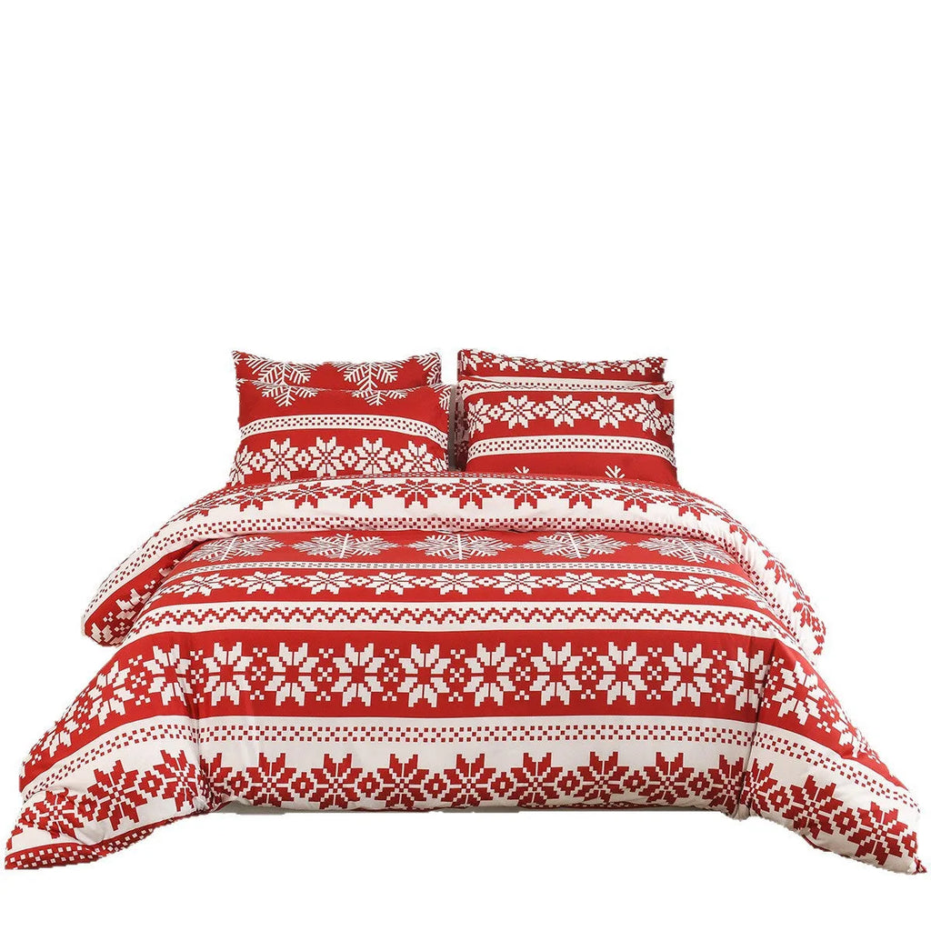 Red Christmas Love Song pattern bed three-piece set with quilt cover and pillowcases on a bed