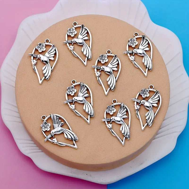 Alloy flying magpie pendant charm with electroplated finish in colour P234 for DIY jewellery making
