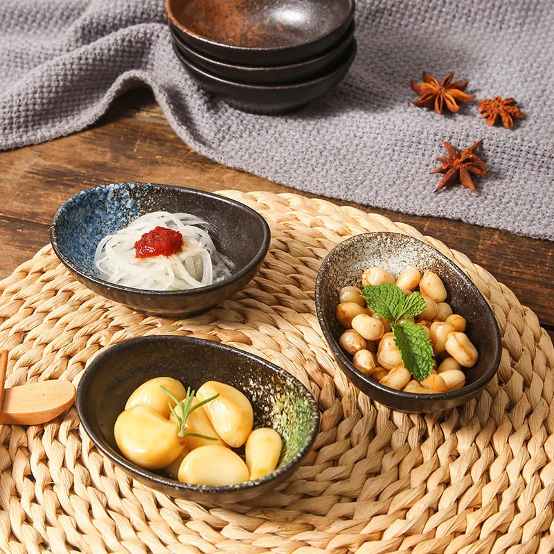 Oval Japanese ceramic sauce dipping bowl with Edo pattern design on underglaze surface