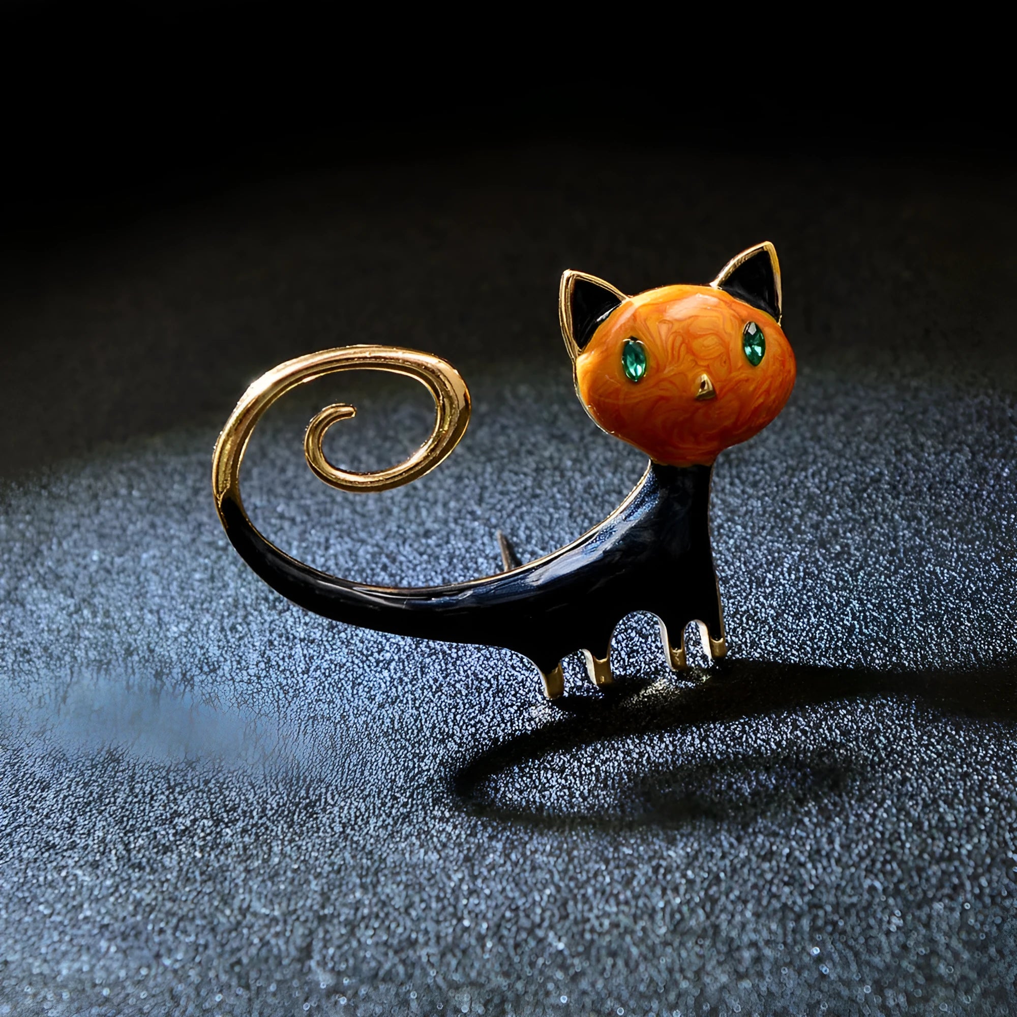 White or orange painted cat brooch with tailing up design on alloy metal