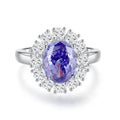 Women's heart-shaped sterling silver ring with an ice flower cut zircon stone in a Tanzanite colour.