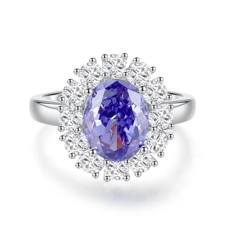 Women's heart-shaped sterling silver ring with an ice flower cut zircon stone in a Tanzanite colour.