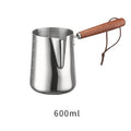 Stainless steel coffee milk pitcher with wooden handle for latte art in three capacity options