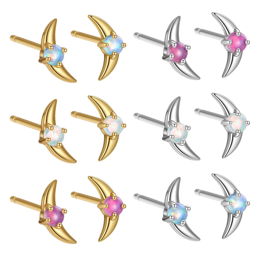 A pair of women's geometric earrings made from 925 silver, shown in gold plating with a blue stone accent.