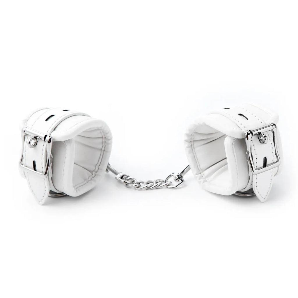White PU sponge bondage set with handcuffs, foot cuffs and neck cuff for BDSM play
