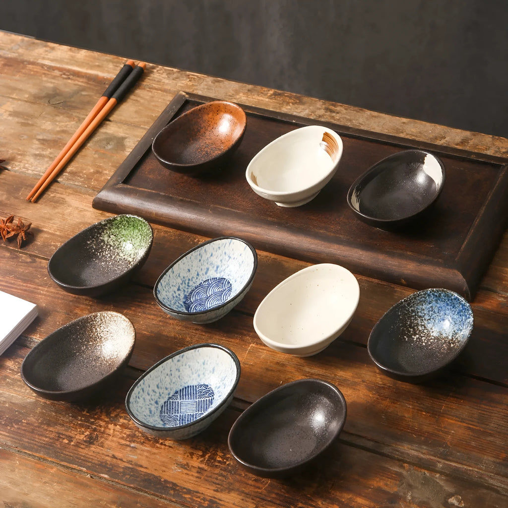 Oval Japanese ceramic sauce dipping bowl with Edo pattern design on underglaze surface