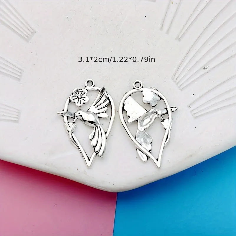 Alloy flying magpie pendant charm with electroplated finish in colour P234 for DIY jewellery making
