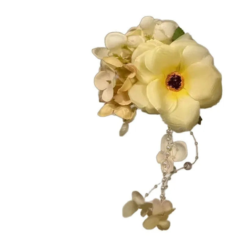 Yellow or purple tassel hair clip with flower decoration and mixed materials