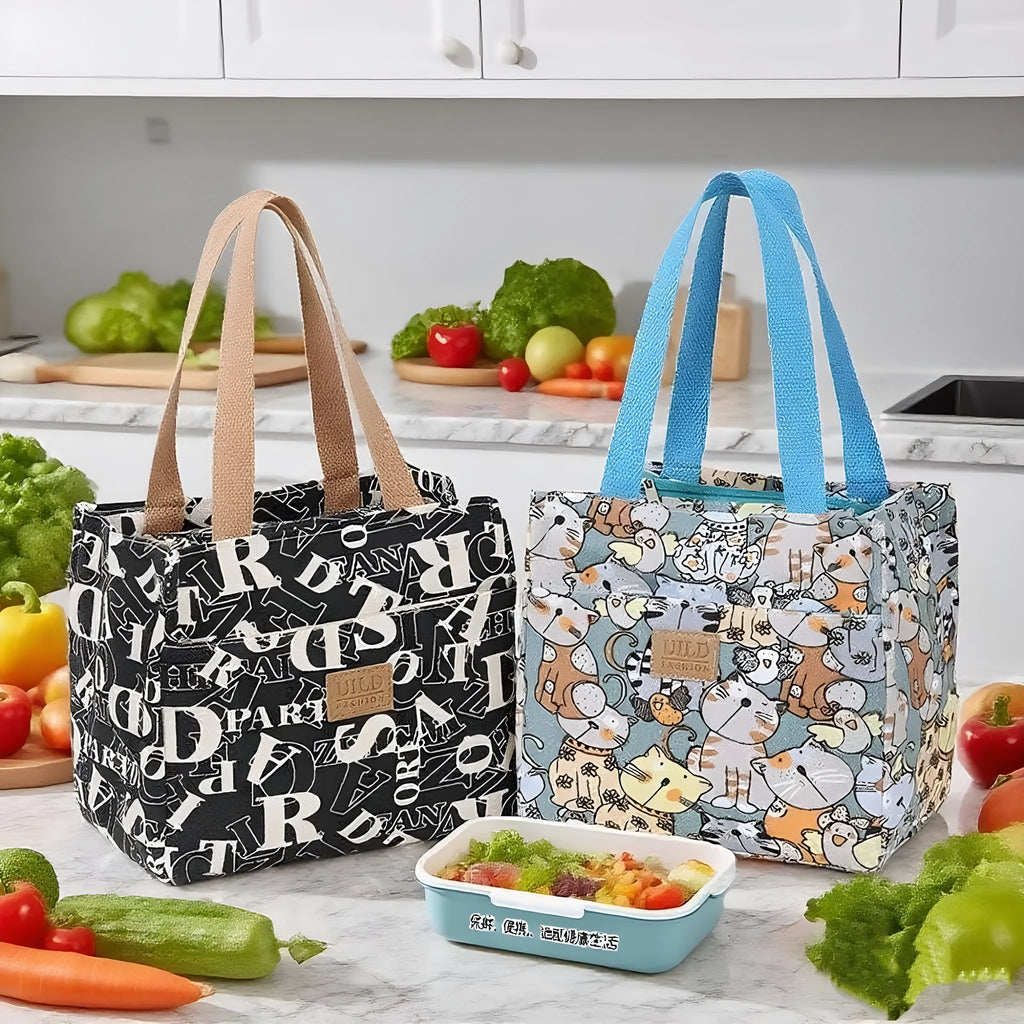 Women's printed canvas handbag with aluminium hardware in a selection of floral and animal designs.