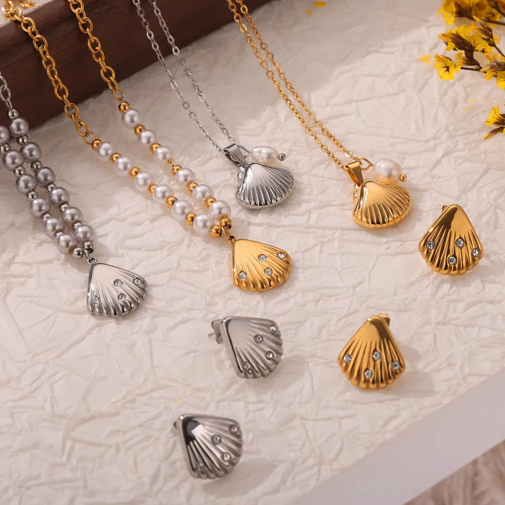 Gold titanium steel necklace with French vintage shell pendant and freshwater pearl beads on O-shaped chain