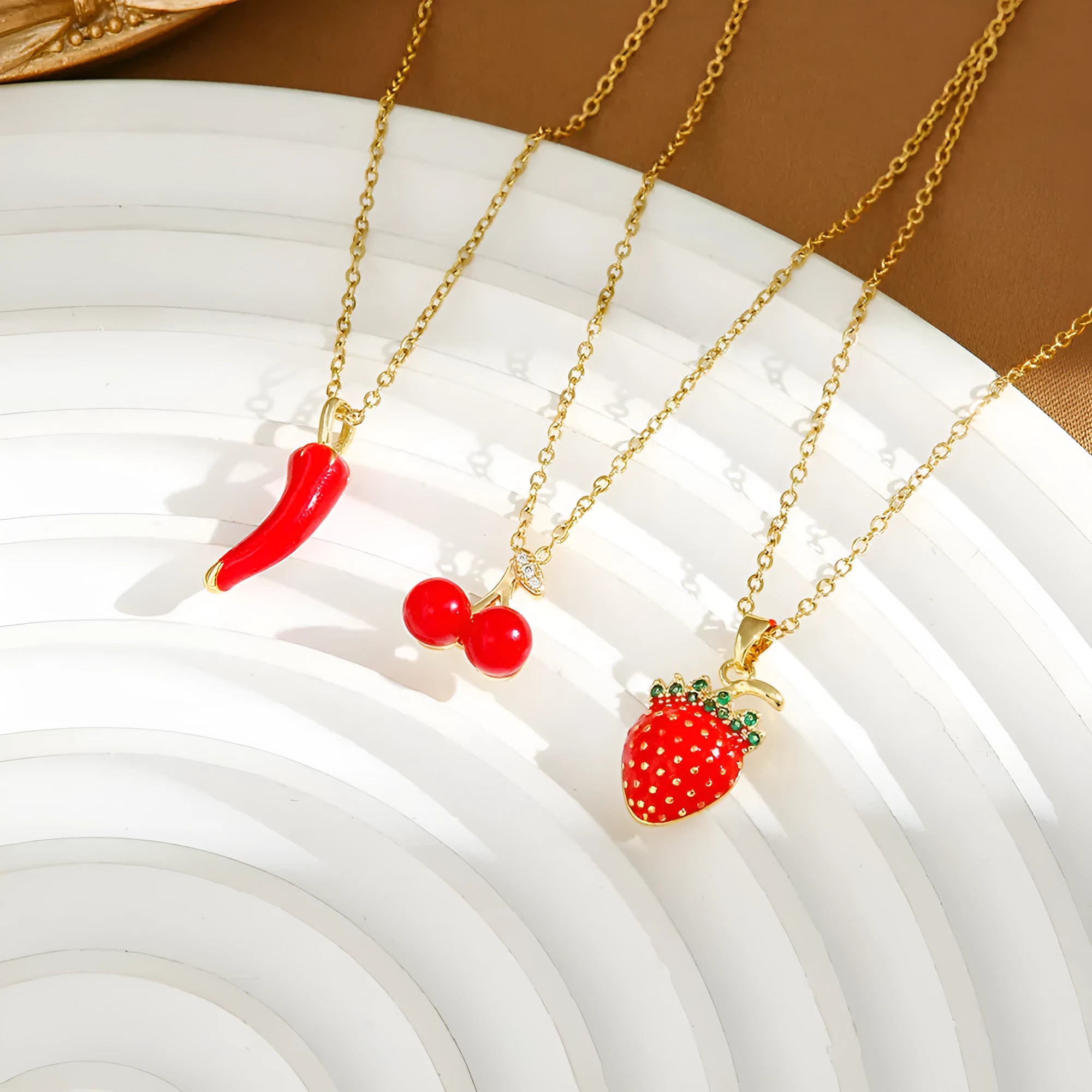 Titanium steel women's necklace with O-ring chain and delicate indie fruit pendant in golden colour options