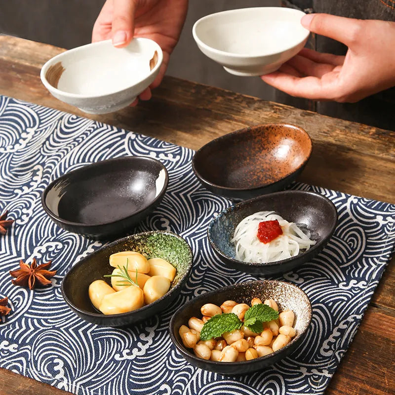 Oval Japanese ceramic sauce dipping bowl with Edo pattern design on underglaze surface