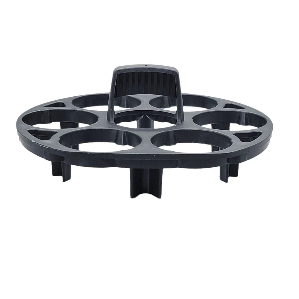 Modern black plastic egg holder tray measuring 13.8 by 12.6 by 5.7 centimetres on a kitchen counter.