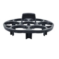 Modern black plastic egg holder tray measuring 13.8 by 12.6 by 5.7 centimetres on a kitchen counter.