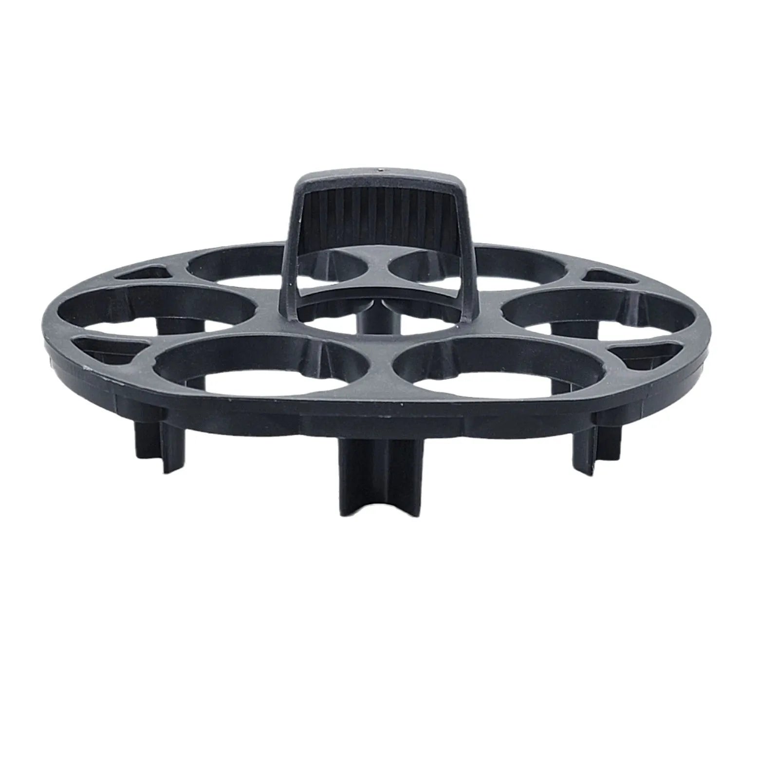 Modern black plastic egg holder tray measuring 13.8 by 12.6 by 5.7 centimetres on a kitchen counter.