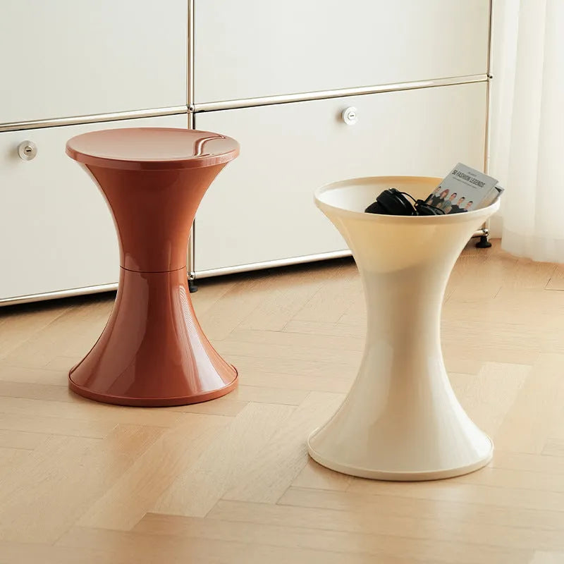Plastic hourglass-shaped shoe changing stool in selected colour