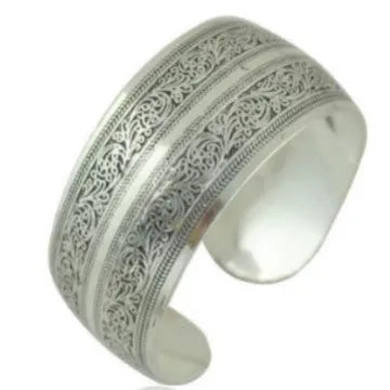 Ethnic carved open Miao silver alloy bracelet in Roman shape with diamond treatment
