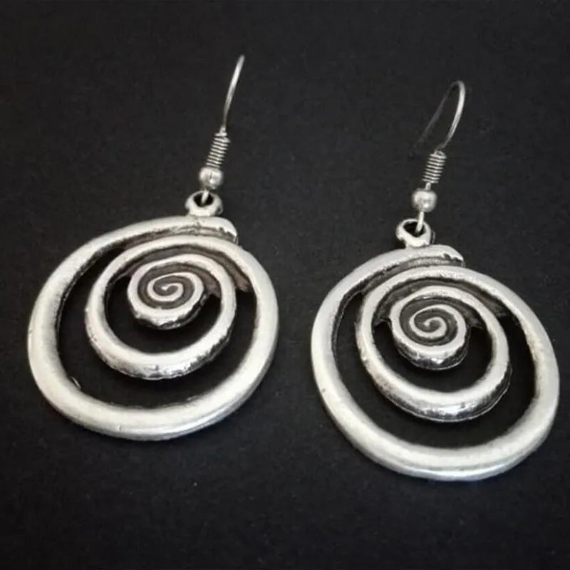 Retro geometric spiral distressed earrings in silver alloy measuring 2.6cm by 5cm