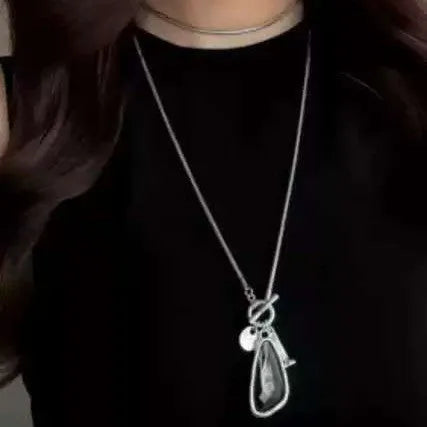 Geometric alloy pendant on long snake bones chain necklace in blue, champagne, or grey colour