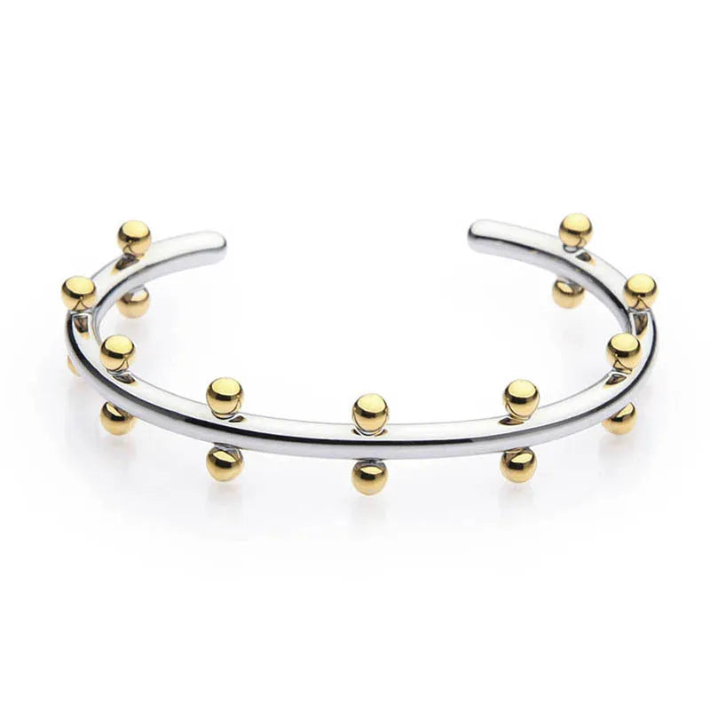 C-shaped stainless steel bean bead bracelet with textured finish and rivet detailing