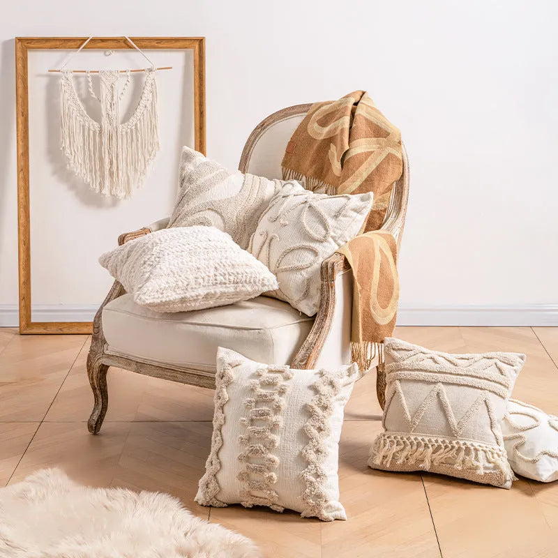 Decorative cushion cover with knitted tassel trim in spiral dots pattern, 45x45cm size.