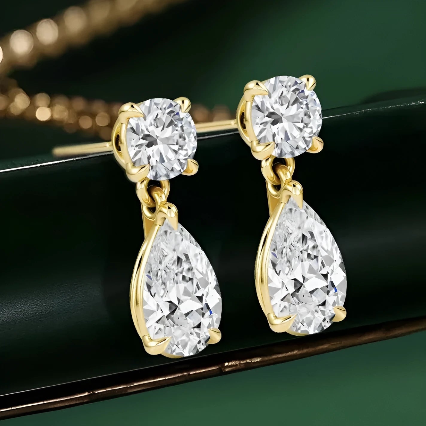 Sterling silver stud earrings with round and water drop moissanite stones in gold or silver plating