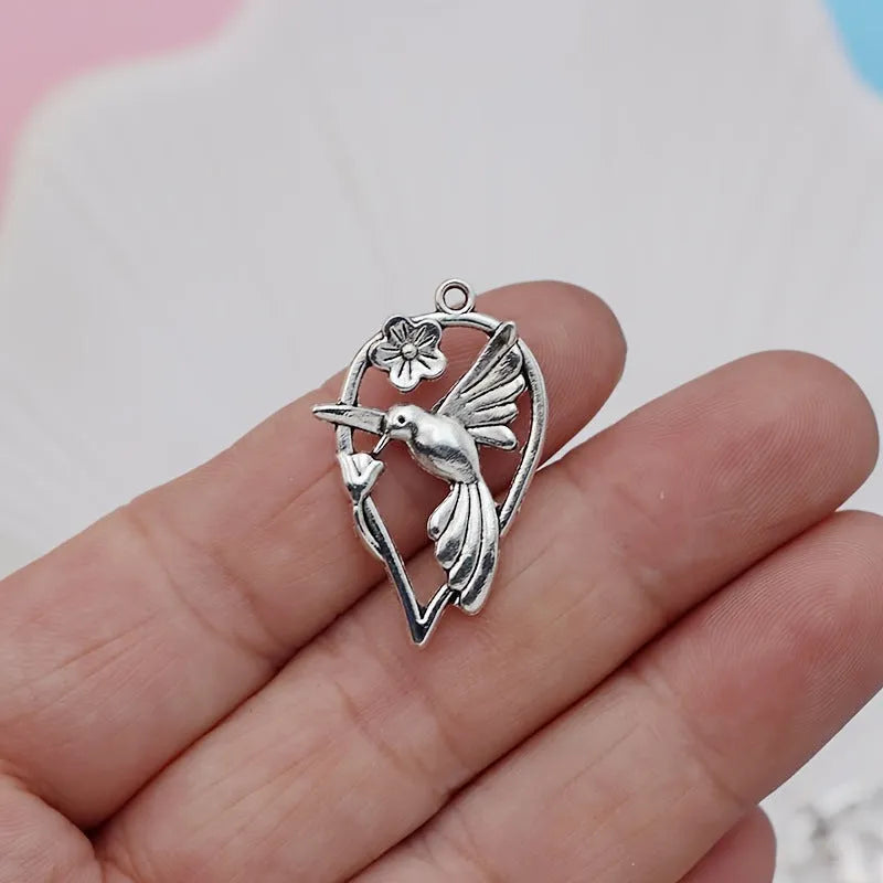 Alloy flying magpie pendant charm with electroplated finish in colour P234 for DIY jewellery making