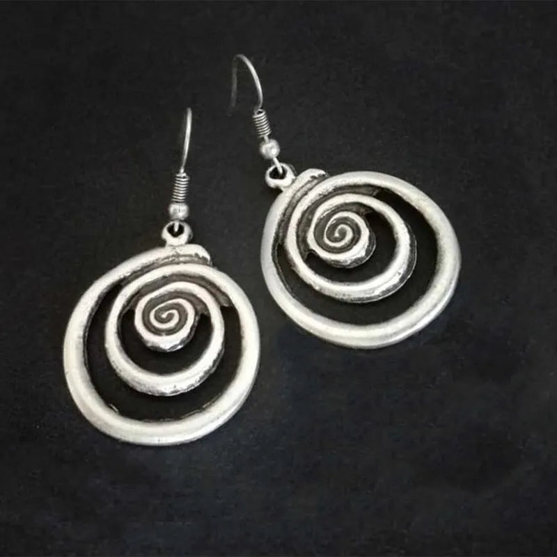 Retro geometric spiral distressed earrings in silver alloy measuring 2.6cm by 5cm