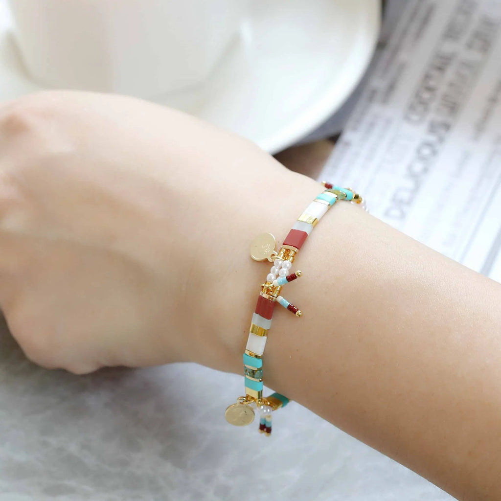 Women's handmade bracelet with imitation pearls and glass coloured beads in six colour options