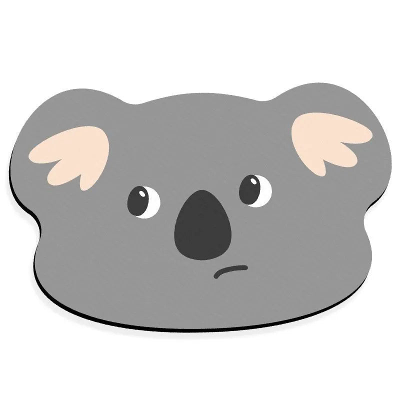 Cartoon animal diatom ooze bathroom mat in sizes 40x60cm, 50x80cm, 60x90cm on a bathroom floor.
