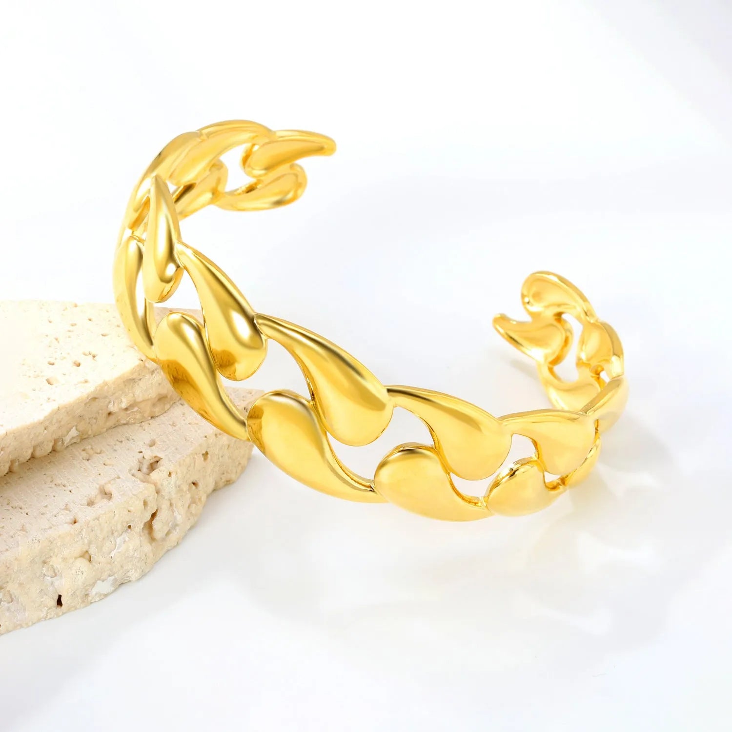 Stainless steel European and American style luxe bracelet on a wrist, showing advanced metallic finish.