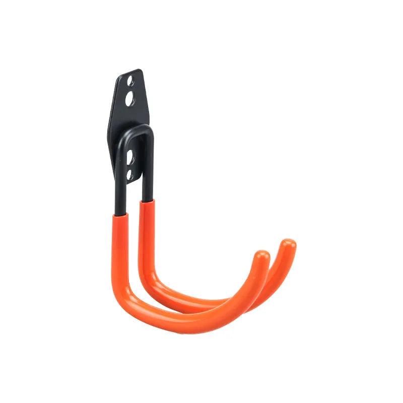 Carbon steel wire-wrap board storage rack with fixed hooks in bright orange finish on wall holding tools